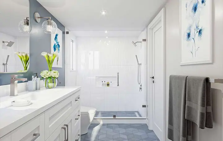 Finished ADU bathroom with a white vanity