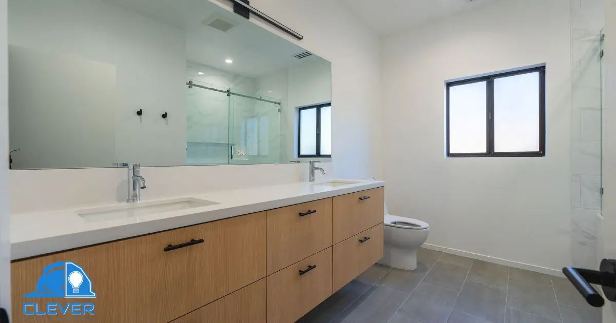 Wood double vanity with backlit mirror and glass shower