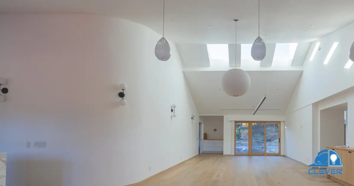 Vaulted living space with skylights, pendant lights and curved walls in the Atherton renovation