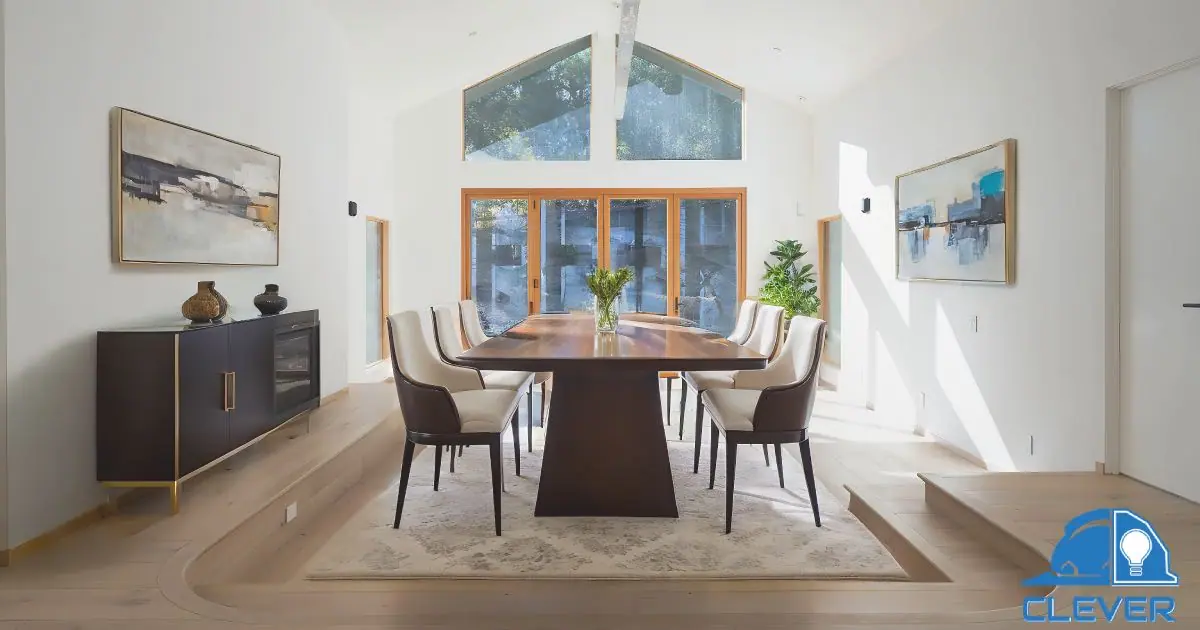 Dining area under a vaulted ceiling with clerestory windows