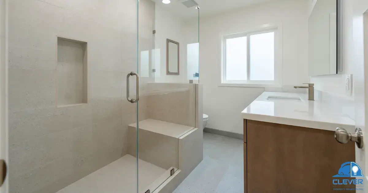 Walk-in shower with a built-in bench and glass enclosure
