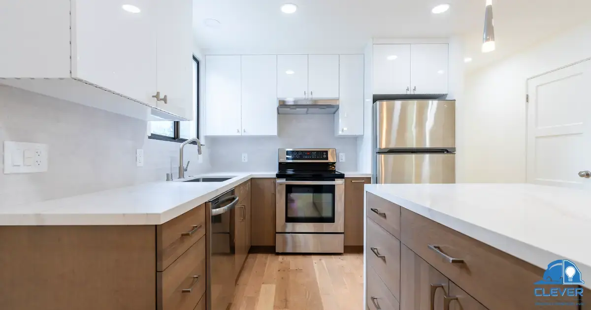 White kitchen with stainless appliances and quartz counters in Menlo Park